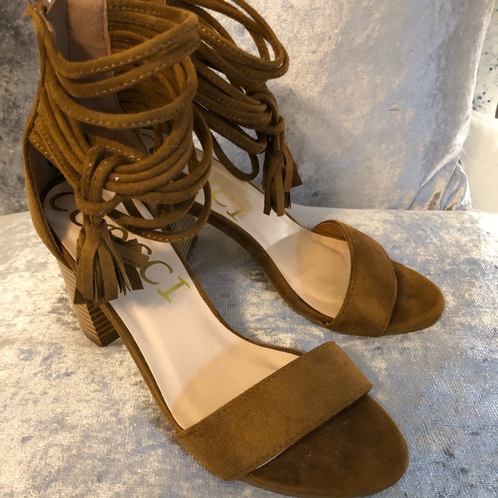 So cute brown suede sandals.